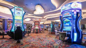 Player placing bet on paten77 login Casino Hold'em mobile app